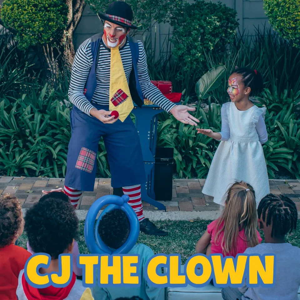 CJ the Clown with a young volunteer during the show
